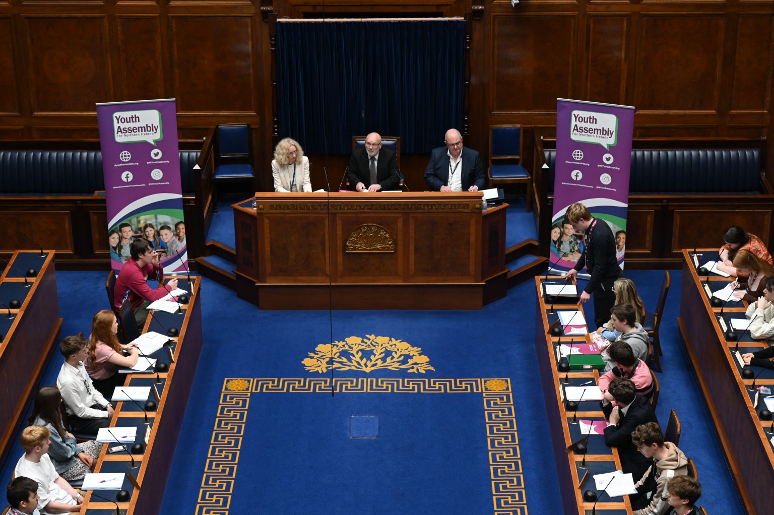 Members of the Youth Assembly in the Assembly Chamber of Parliament Buildings.