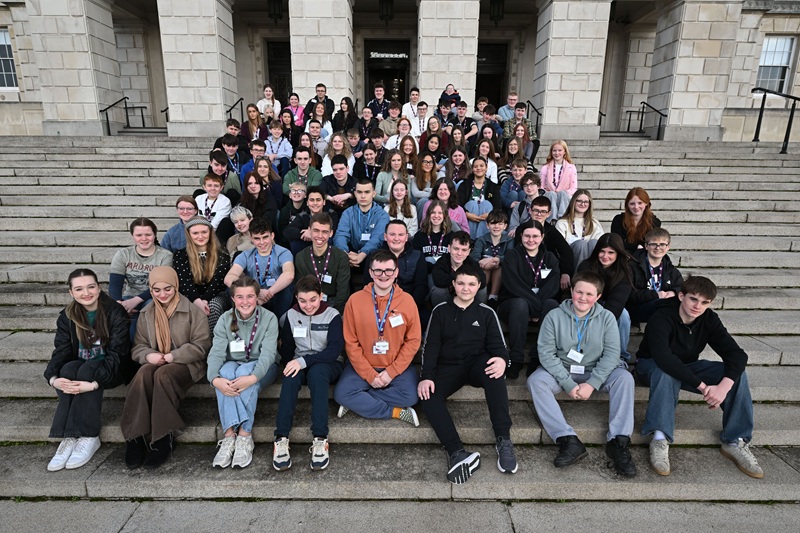 Members of the third mandate of the Northern Ireland Assembly's Youth Assembly on the front steps in front of the main entrance of Parliament Buildings, Stormont Estate.